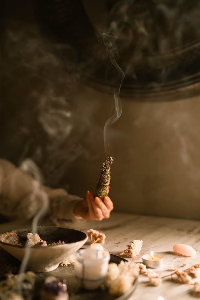 about-01 A serene ritual scene showcasing burning incense and candles, creating a mysterious and mystical atmosphere.