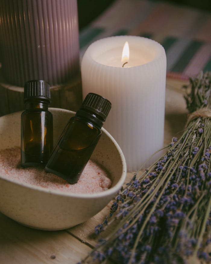 gallery-1 Close-up of essential oils, candles, and lavender for a calming spa ambiance.